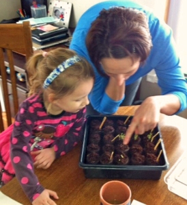 Brenda enjoys a simple, yet significant,  moment with her daughter planting seeds